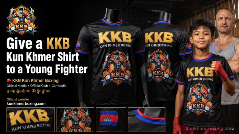 Give an official KKB Kun Khmer Boxing shirt to a young Cambodian fighter